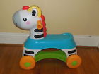 Ride- Tunes Zebra Fisher-price Rollin