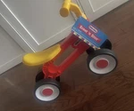 Little Tikes Scoot 'n Steer Ride-on Tricycle Red Yellow 4 Wheels. Fixed Price $19.99.