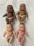 U. Toy Constructive Playthings Huggable Multi-cultural Baby Dolls For Kids.... Fixed Price $57.80.