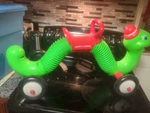 Radio Flyer 73 Ride-on Inchworm Toy. Fixed Price $75.00.
