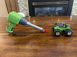 Hot Wheels Monster Jam Grave Digger Truck W/ Rev Stunt Wrench. Fixed Price $13.00.
