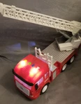 Funerica Toy Fire Truck With Lights, Sirens, Friction Motor, Folding Ladder. Fixed Price $14.99.