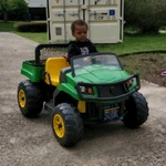 Peg Perego John Deere Green And Yellow Battery Operated Ride-on Toy Vehicle. Fixed Price $100.00.
